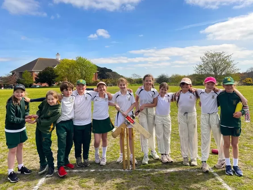 Students taking part in cricket activities at a UK boarding school