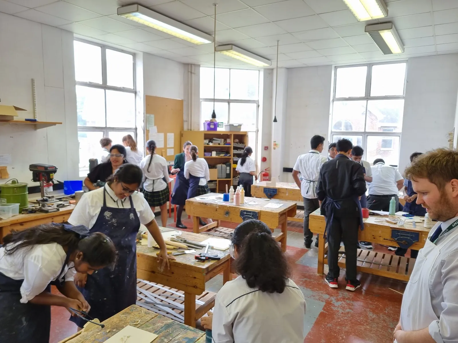 Students working together in a practical workshop at a UK boarding school