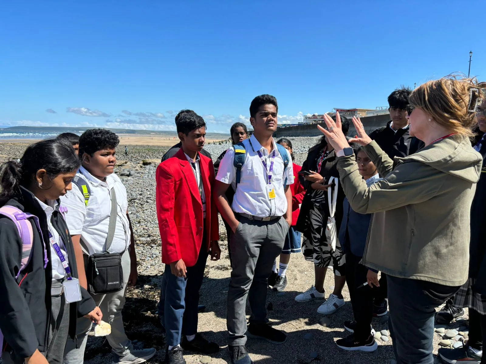 Students learning about the coastal environment during marine biology fieldwork